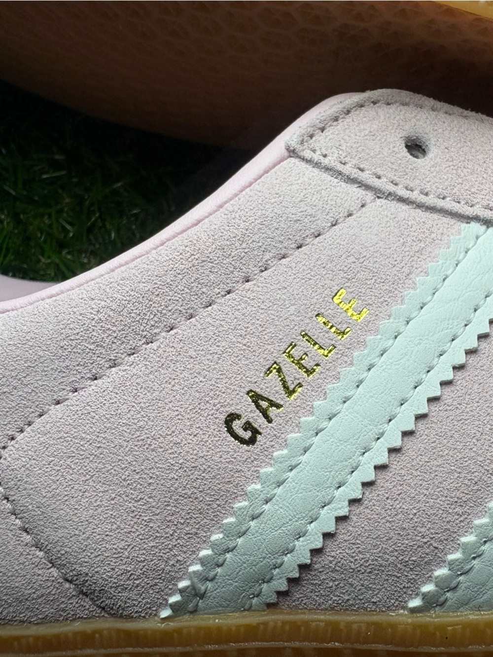 Adidas Gazelle Suede Sneakers in Light Pink with white Stripes and a blue heel. - Picture 2 of 8